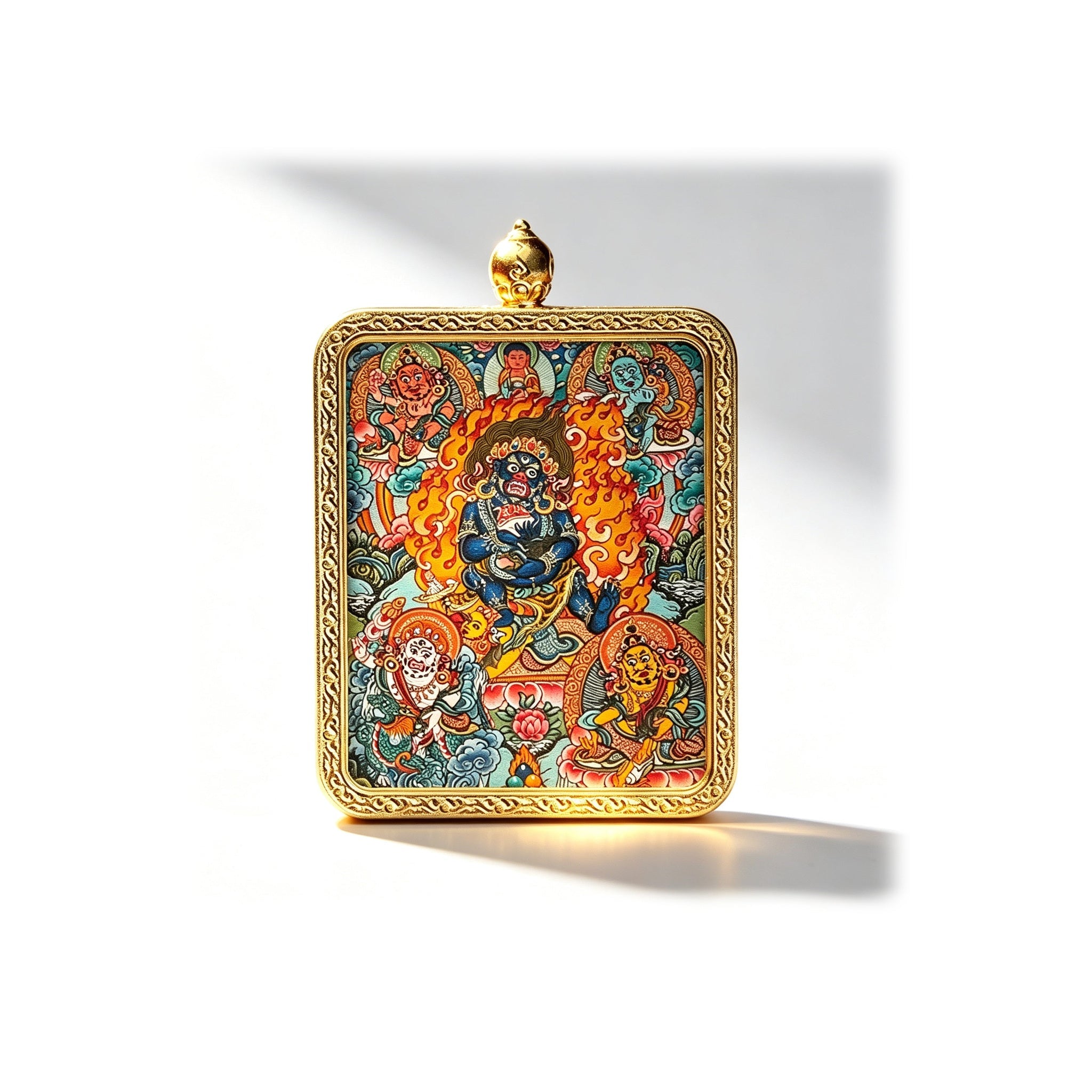 Hand-painted Mahakala miniature thangka pendant — centered studio view