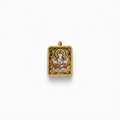 Hand-painted Tibetan miniature art pendant — Four-Armed Avalokiteshvara (No. 02) — studio view