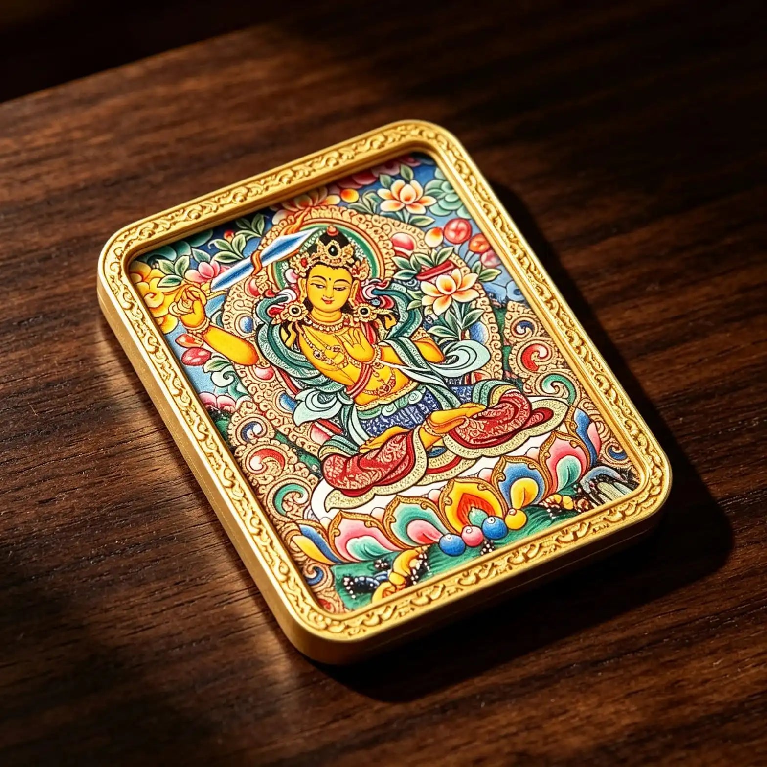 Hand-painted Manjushri miniature pendant displayed on a wooden surface