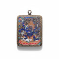 Hand-painted Tibetan miniature art pendant — Six-Armed Mahakala — studio view